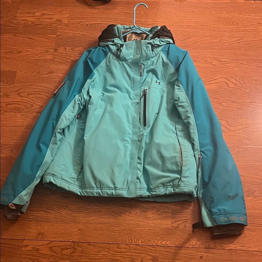 Women's Teal Jacket Under Armour used some staining